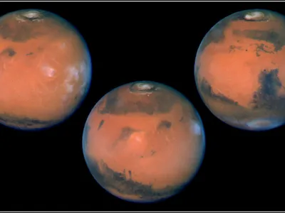 These images show the planet on the last day of Martian spring in the northern hemisphere (just before summer solstice). The annual north polar carbon dioxide frost (dry ice) cap is rapidly sublimating, revealing the much smaller permanent water ice cap.